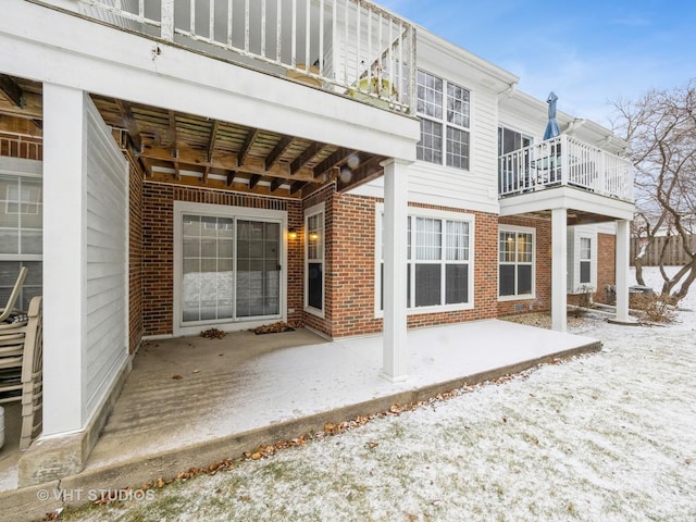 view of snow covered property