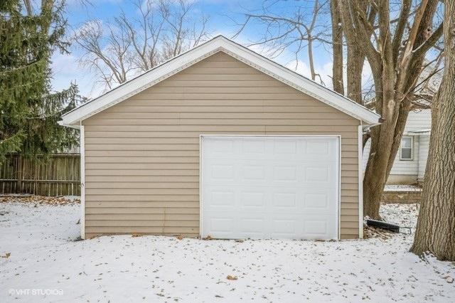 view of snow covered garage