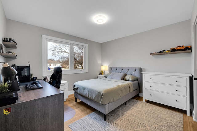 bedroom featuring light hardwood / wood-style flooring