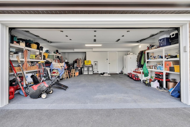 garage with white refrigerator