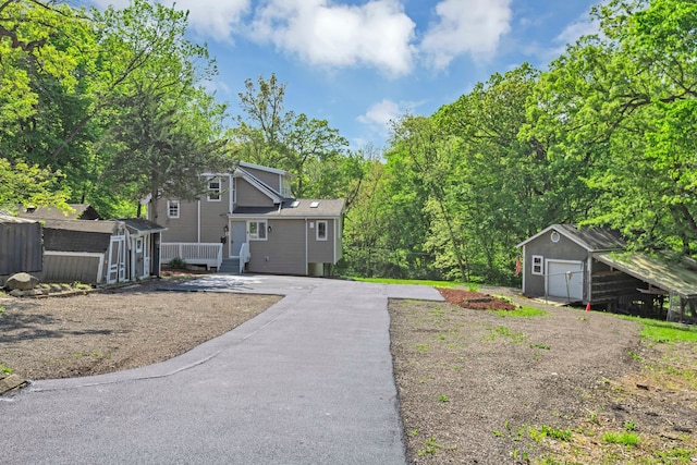 6N772 Tuscola Ave, Saint Charles, IL 60174 - view of yard with a storage unit and an outbuilding
