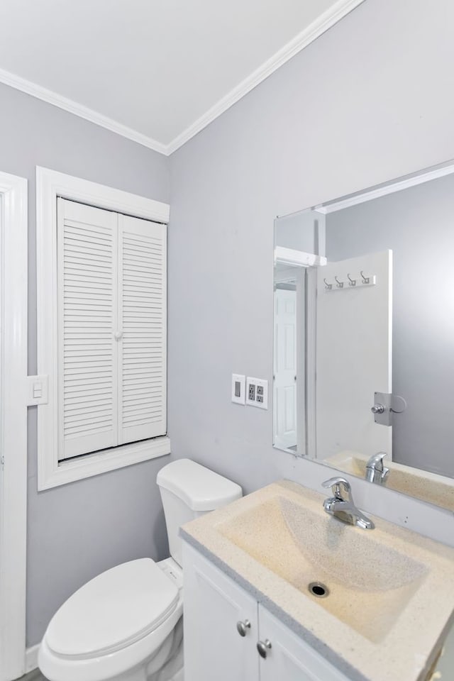 6N772 Tuscola Ave, Saint Charles, IL 60174 - half bathroom with ornamental molding, toilet, and vanity