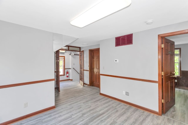 6N772 Tuscola Ave, Saint Charles, IL 60174 - spare room with light wood-style flooring, baseboards, healthy amount of natural light, and a smoke detector