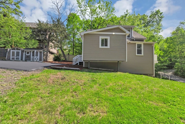 6N772 Tuscola Ave, Saint Charles, IL 60174 - back of house featuring a storage unit and an outdoor structure
