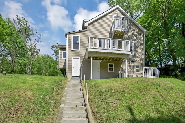 6N772 Tuscola Ave, Saint Charles, IL 60174 - back of house featuring a balcony, a lawn, and stairs