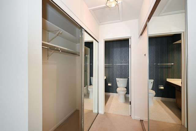 hallway with light tile patterned floors