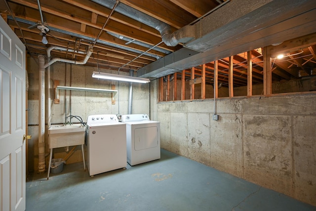 basement featuring washer and dryer