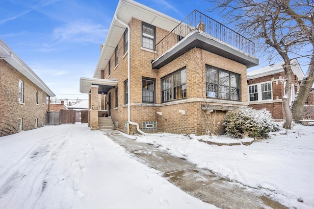 view of snow covered property