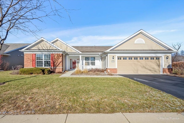 ranch-style home with a garage and a front lawn