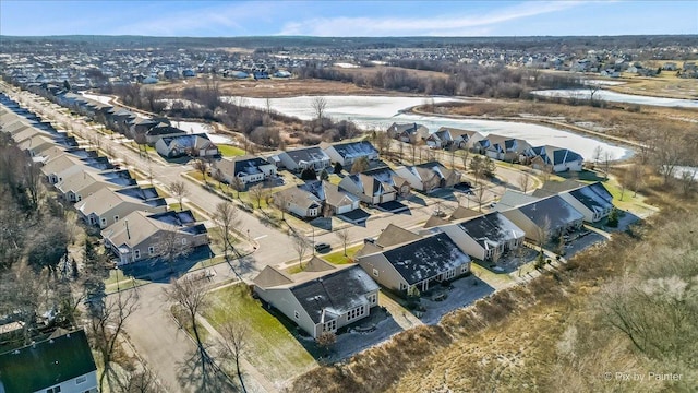 drone / aerial view featuring a water view