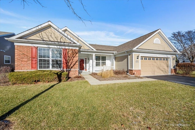 view of front of house with a garage and a front lawn