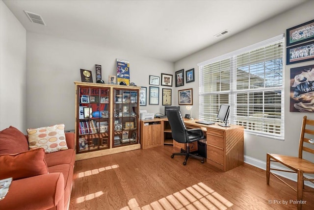 office space featuring light wood-type flooring