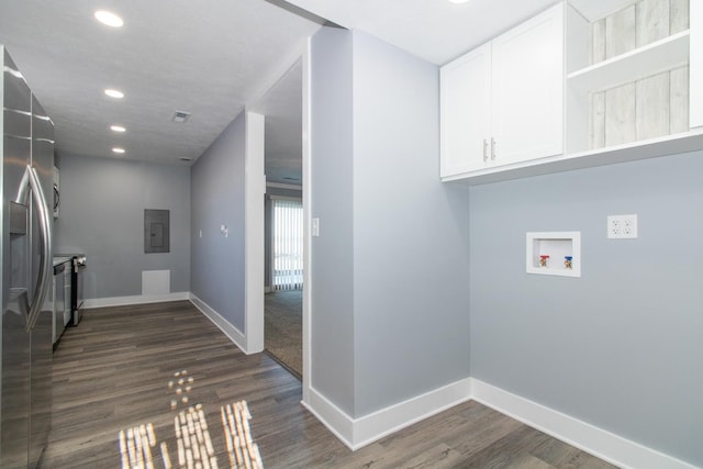 laundry room with electric panel, dark hardwood / wood-style flooring, and hookup for a washing machine