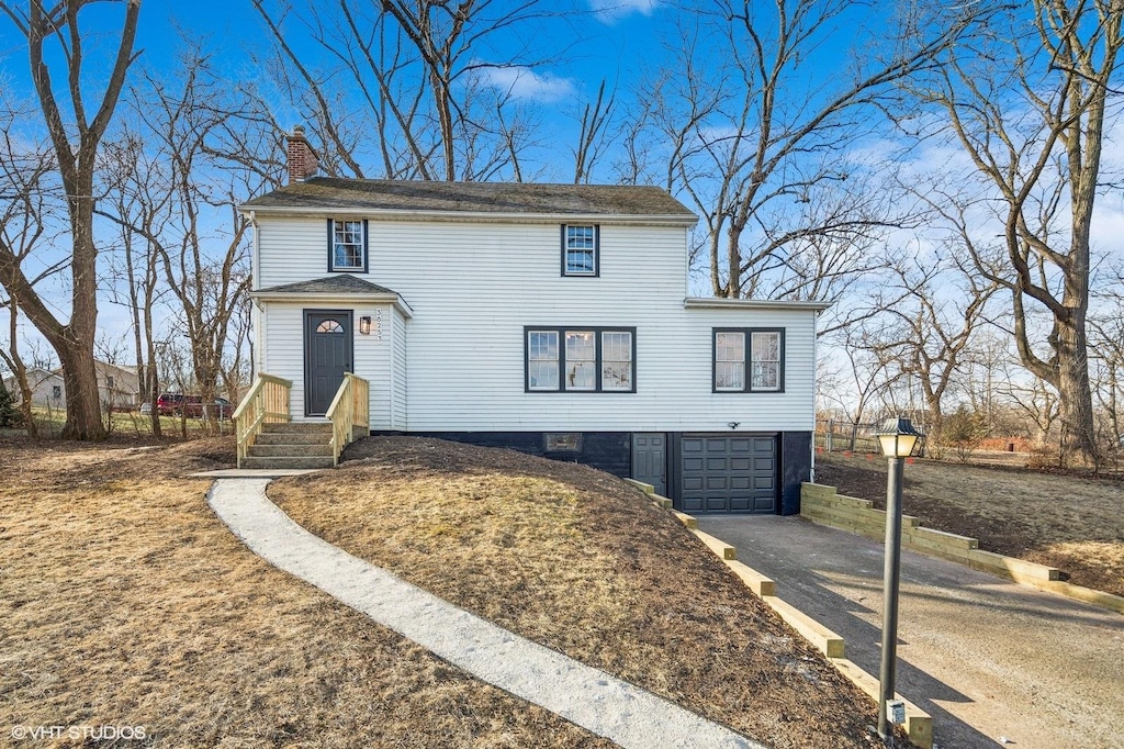 view of front of home with a garage