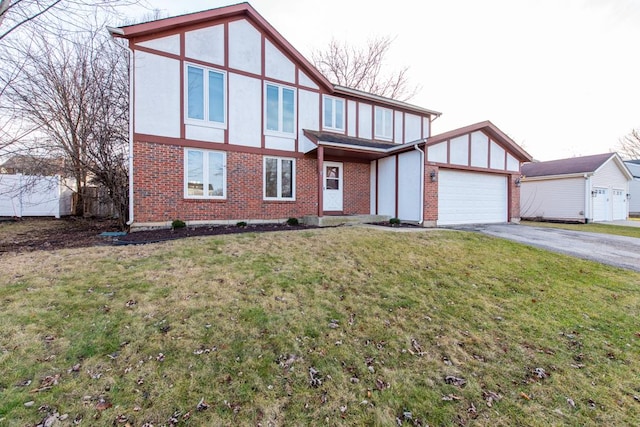 view of front facade with a front yard and a garage