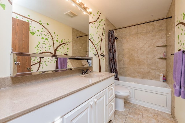 full bathroom featuring tile patterned flooring, vanity, toilet, and shower / bath combo with shower curtain