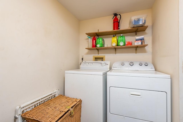 laundry area featuring independent washer and dryer