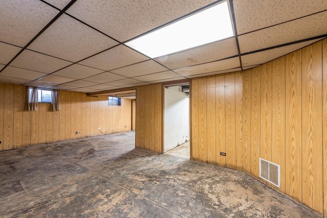 basement with wood walls