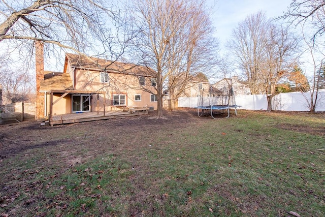 view of yard featuring a trampoline