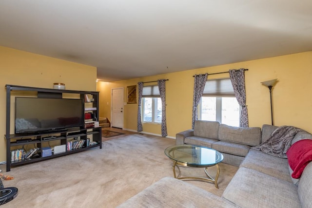 living room featuring light carpet