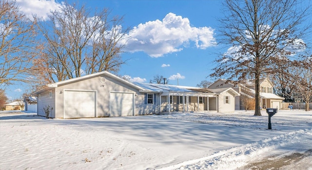 ranch-style home featuring a garage