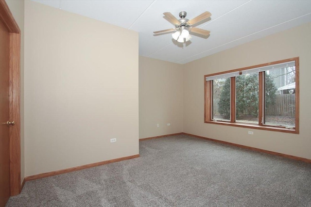 unfurnished room with carpet flooring and ceiling fan