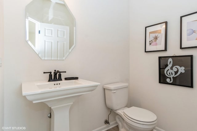 bathroom featuring toilet