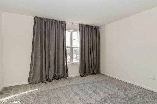 view of carpeted spare room