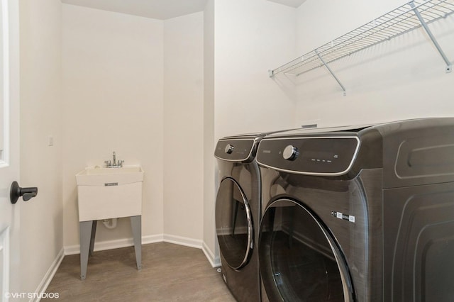 laundry area featuring washer and clothes dryer