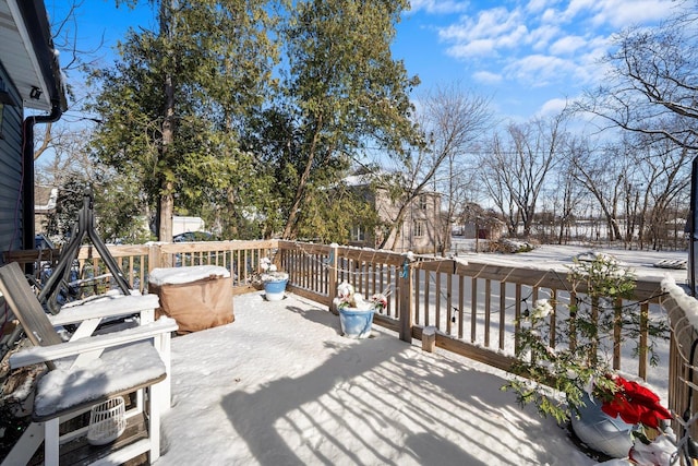 view of snow covered deck