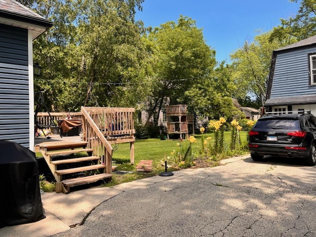 view of yard featuring a deck