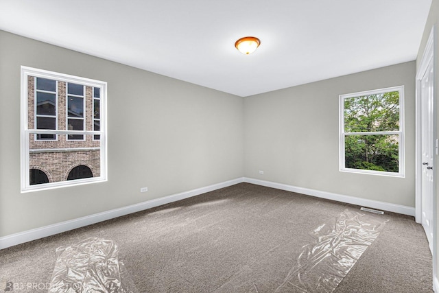 view of carpeted spare room