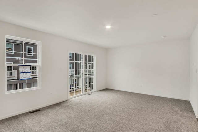 view of carpeted spare room