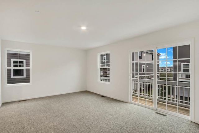 view of carpeted spare room