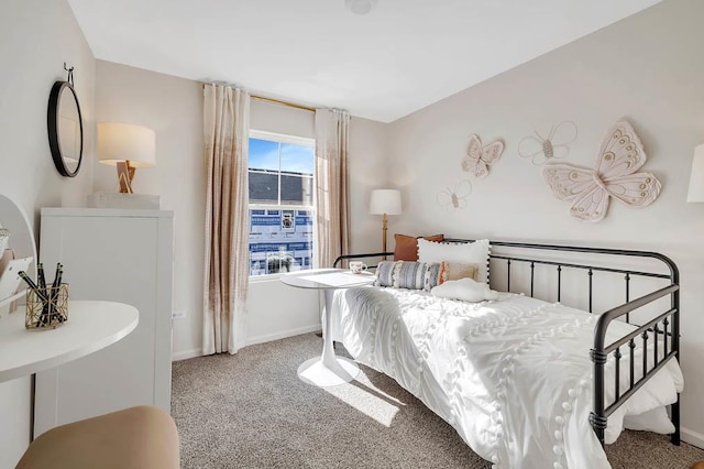 carpeted bedroom featuring multiple windows