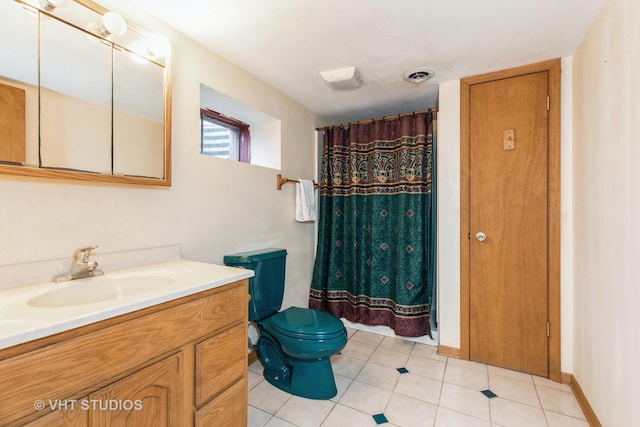 bathroom with toilet, a shower with curtain, vanity, and tile patterned floors