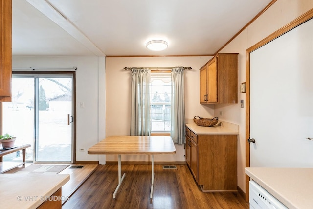 dining area with dark wood-type flooring