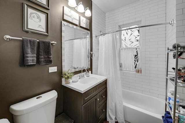 full bathroom featuring vanity, toilet, and shower / bath combo with shower curtain