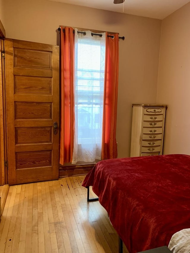 bedroom with light wood-type flooring