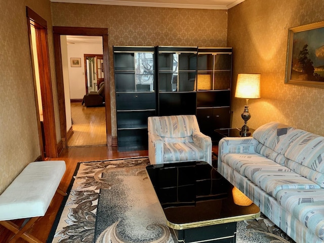 interior space featuring hardwood / wood-style flooring and ornamental molding