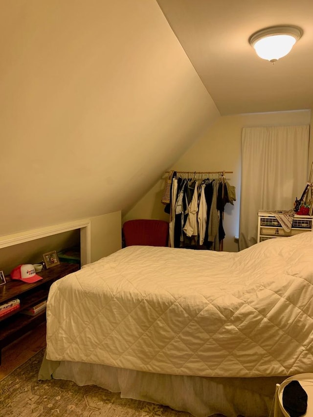 bedroom with vaulted ceiling