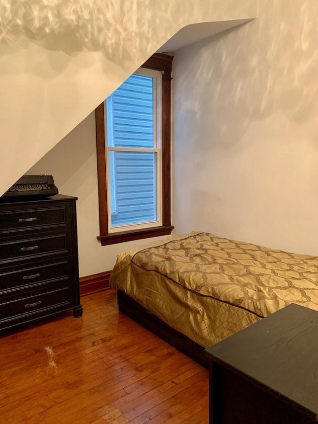 bedroom featuring hardwood / wood-style floors