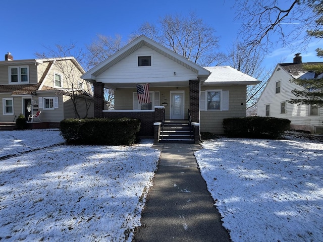 bungalow-style home featuring covered porch