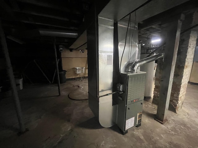 utility room with heating unit