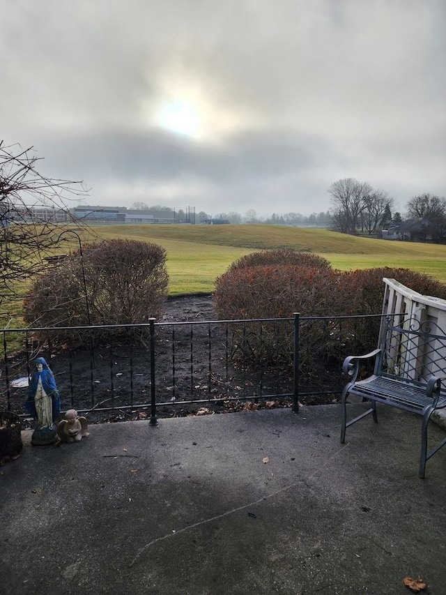 view of patio / terrace with a rural view