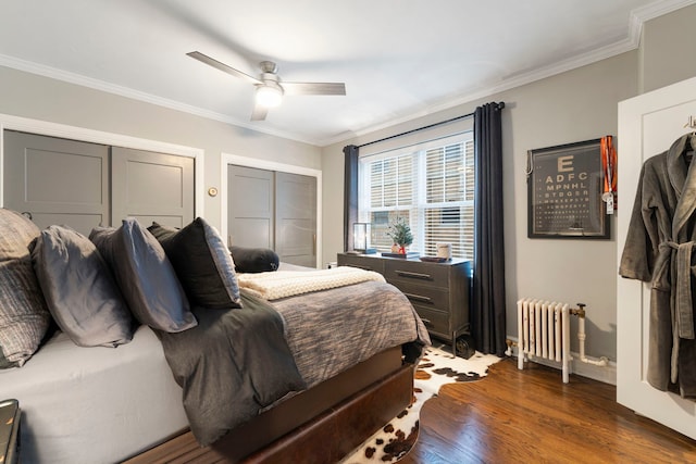 bedroom featuring ceiling fan, crown molding, dark wood-type flooring, and radiator