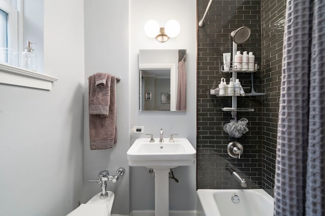 bathroom with shower / tub combo