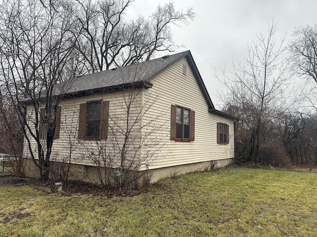 view of home's exterior featuring a lawn