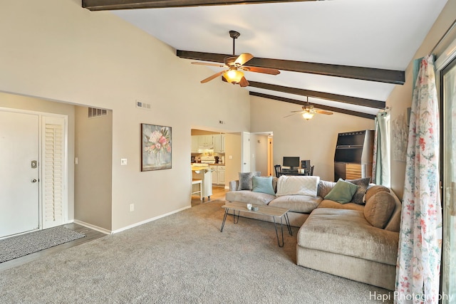 living room with carpet flooring, ceiling fan, beamed ceiling, and high vaulted ceiling