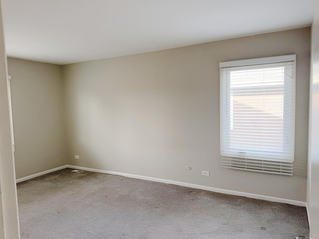 6111 Pingree Rd, Crystal Lake, IL 60014 - empty room featuring carpet flooring and baseboards